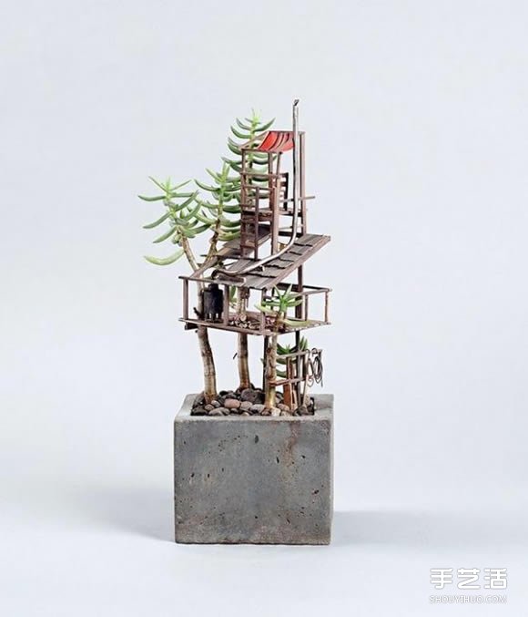 在盆栽上搭造出小小世界 迷你树屋模型图片