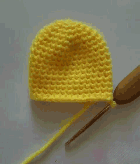 手工毛线编织小黄人钥匙包步骤图片
